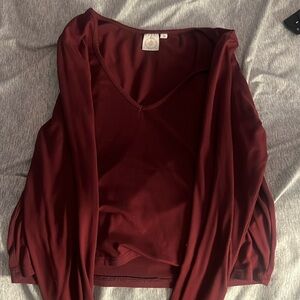 a maroon, medium, live in the moment long sleeve shirt.